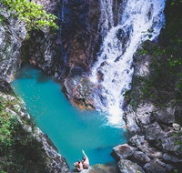 Explore Maleny Montville and take a swim under the waterfall. - Sunshine Coast Tourism