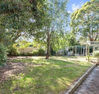 GUMS  ROSES Family home in the heart of town.