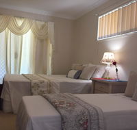 Theme Parks Amituofo Guest House - Sunshine Coast Tourism