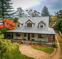 Whispering Pines Cottages - Sunshine Coast Tourism